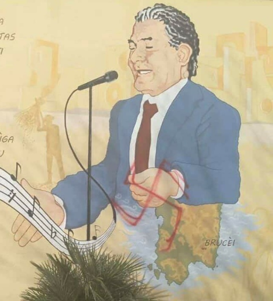 Una svastica sul murale del poeta Raffaele Urru: l'indignazione della comunità di Burcei