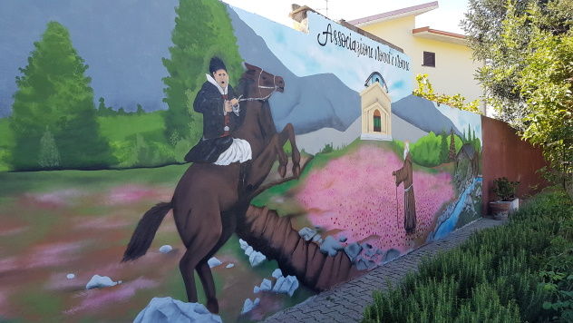 Grande festa ieri a Domusnovas in onore dei nonni: inaugurato un murale a Cracchera dedicato a Sant’Ignazio