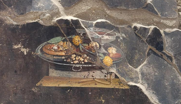 Pompei, scoperta l'antenata della pizza in un affresco